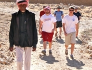 Musa leading group Petra Jordan Tour