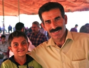 Mustachioed Arab man with son - Jordan tour