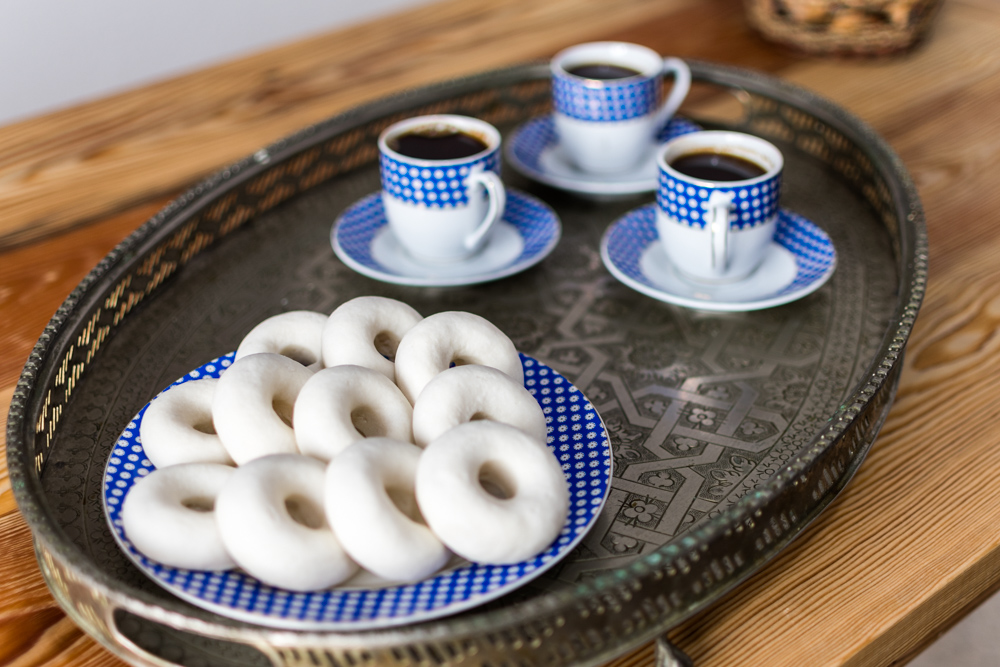 Tunisian kaak warka and traditional Turkish coffee on a plate